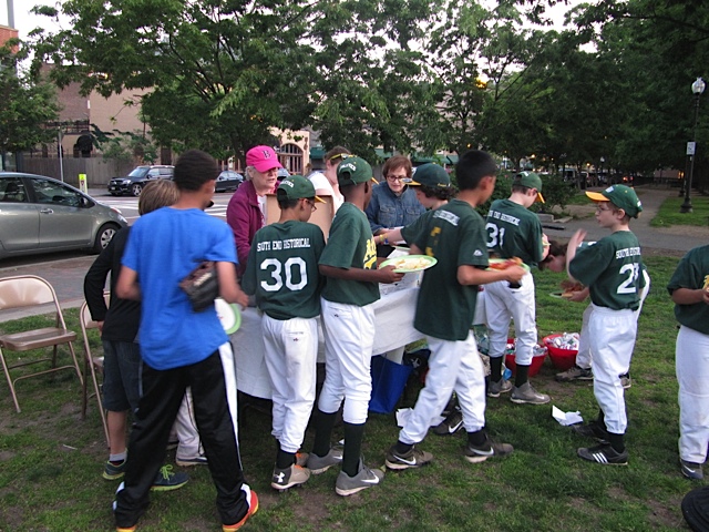 The team descends upon the pizza at our picnic for South End Baseball